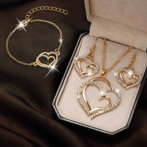 kit of necklace, 1 bracelet and 1 pair of gold color earrings